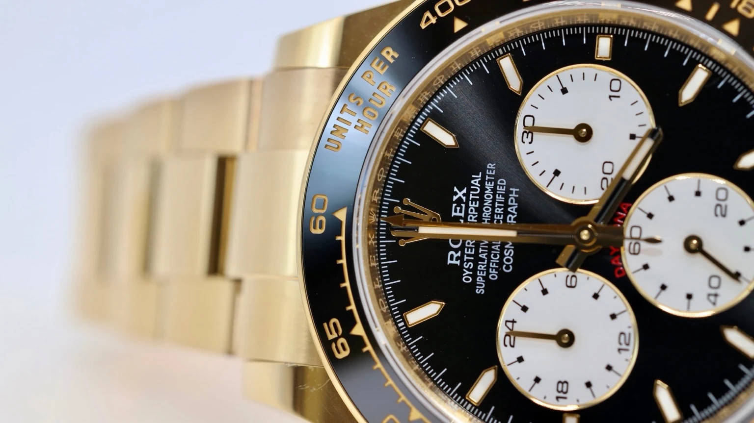 Close-up of a yellow-gold-finished chronograph dial