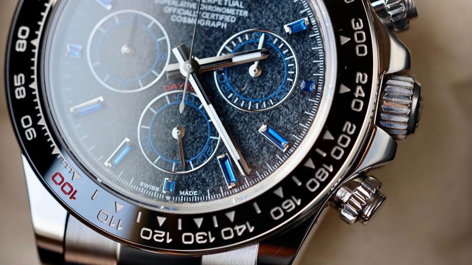 Close-up of the obsidian dial, blue sapphire details and Le Mans bezel of the custom Daytona