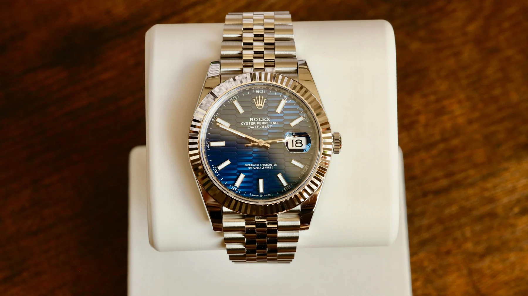 Blue motif date watch — full watch view