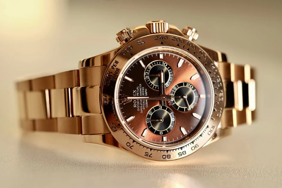 Chocolate dial bracelet chronograph — full watch view