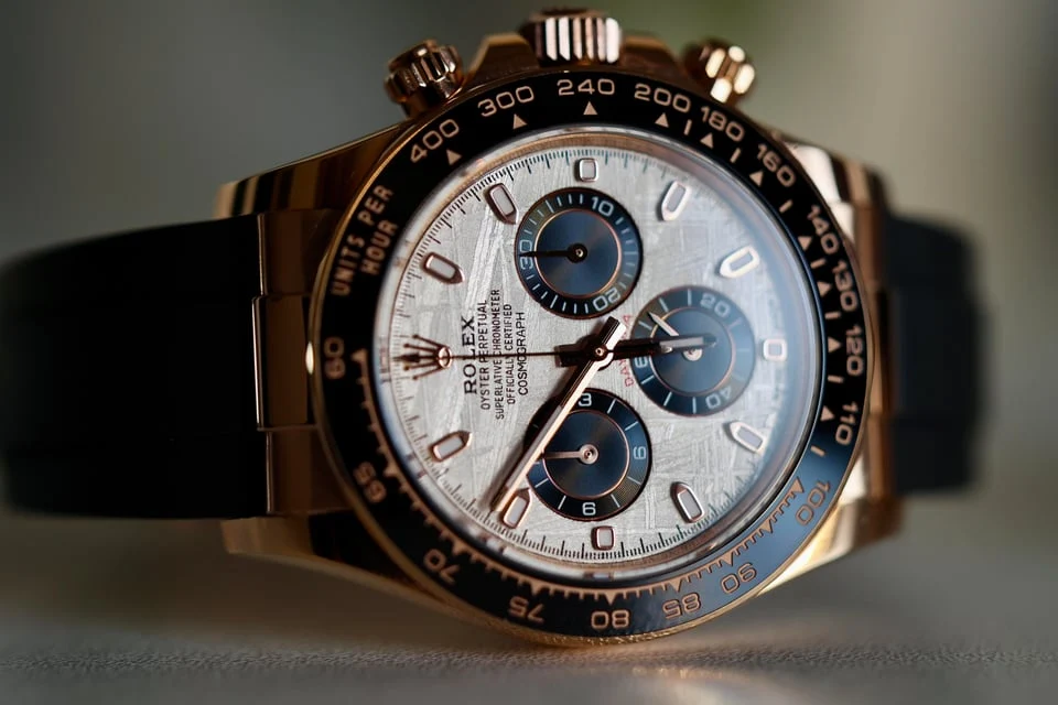 Pale blue dial chronograph on rubber — full watch view