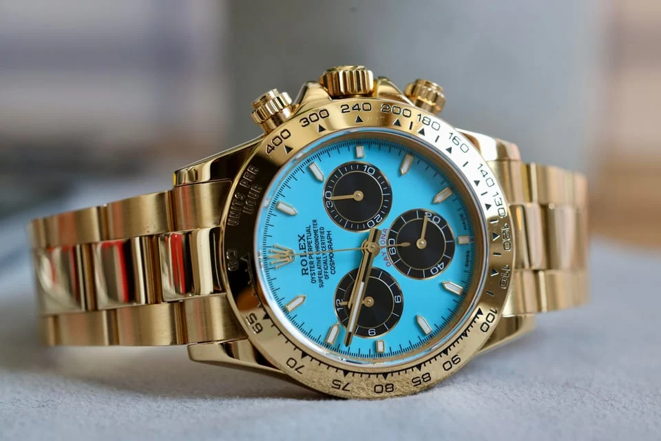 Turquoise & gold bracelet chronograph — full watch view