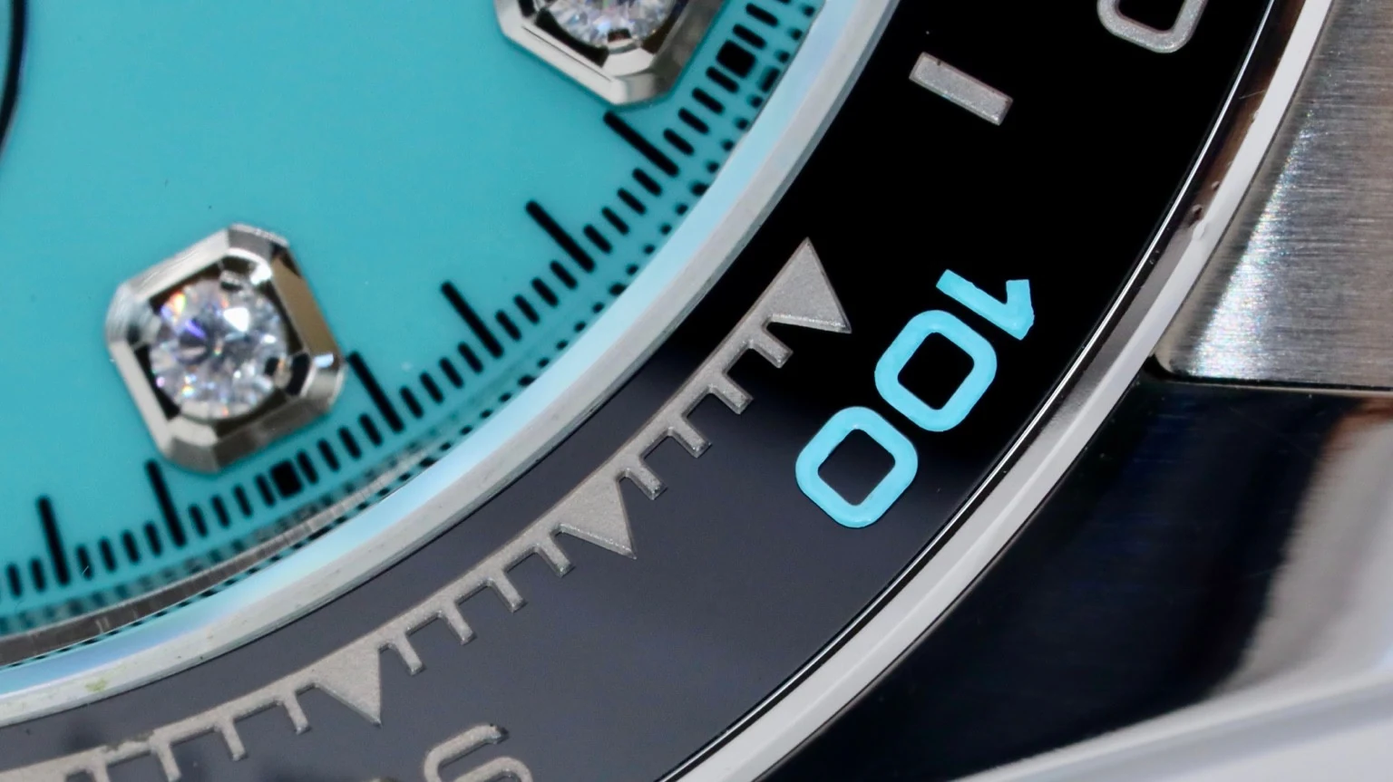 Turquoise dial detail and matching bezel markings on a custom chronograph